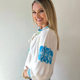Split Neck Tasseled Embroidered Top