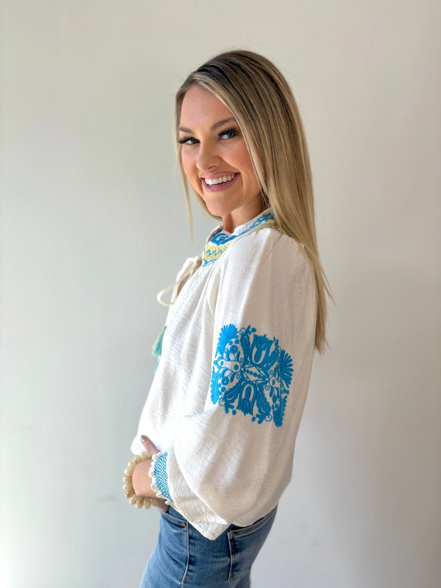 Split Neck Tasseled Embroidered Top