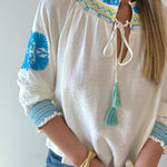 Split Neck Tasseled Embroidered Top