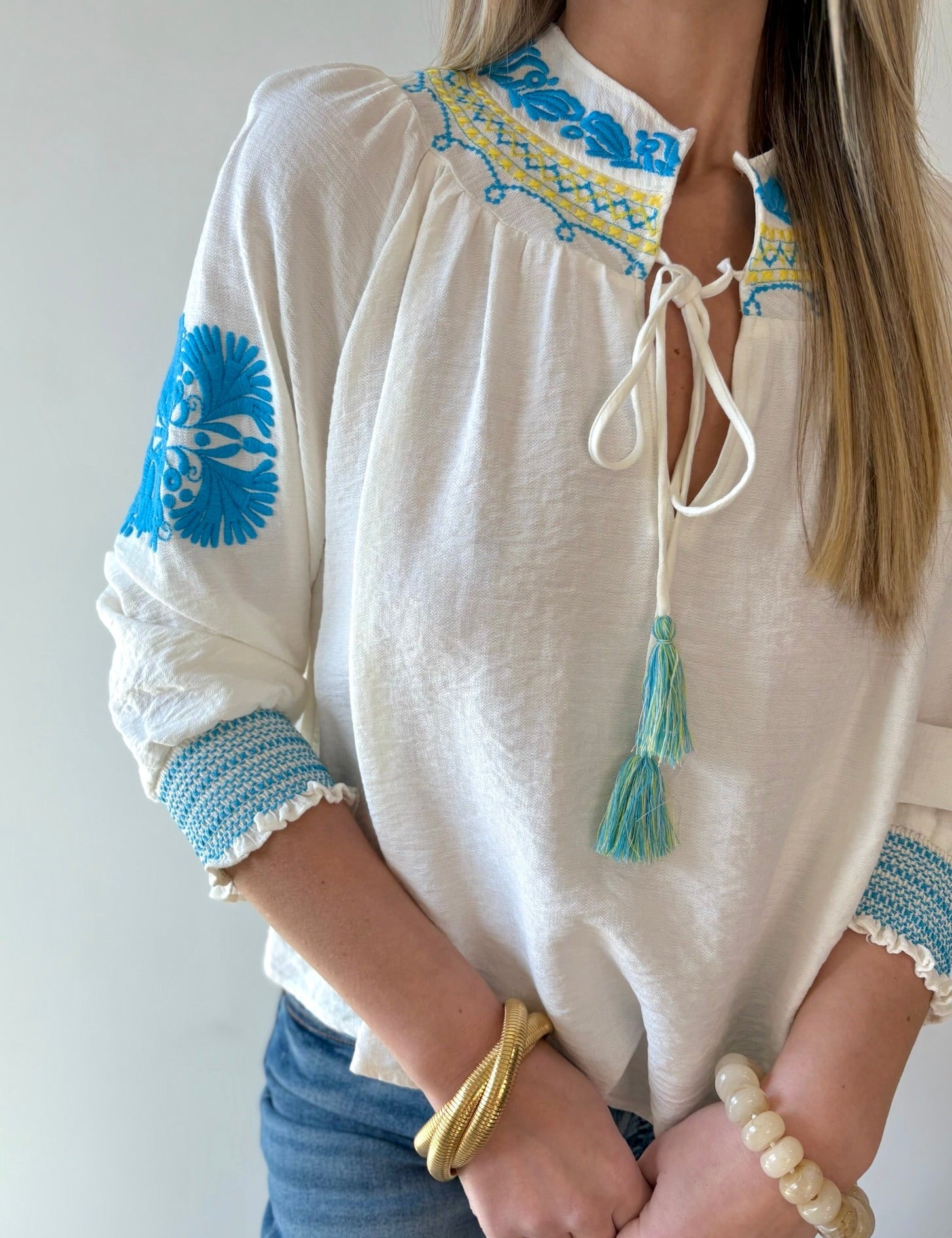 Split Neck Tasseled Embroidered Top