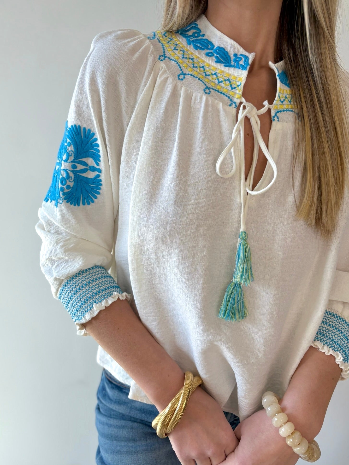 Split Neck Tasseled Embroidered Top